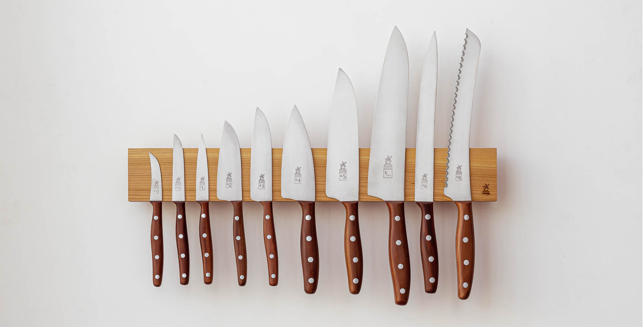 Windmühlenmesser kitchen knives on a wooden magnetic rack